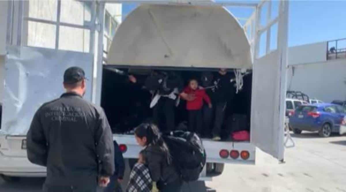 Rescatan a 59 migrantes hacinados en tinacos en Allende