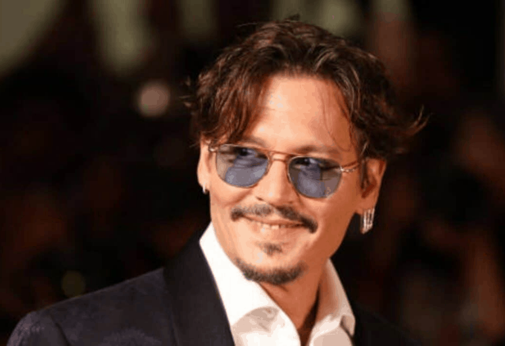 Johnny Depp gana demanda a su ex esposa Amber Heard