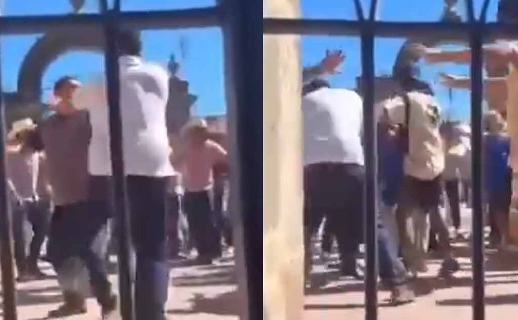 En el video se puede observar a varios sujetos golpeándose mientras una mujer pide auxilio detrás de la reja que resguarda el recinto católico. Foto: X @JaliscoRojo.