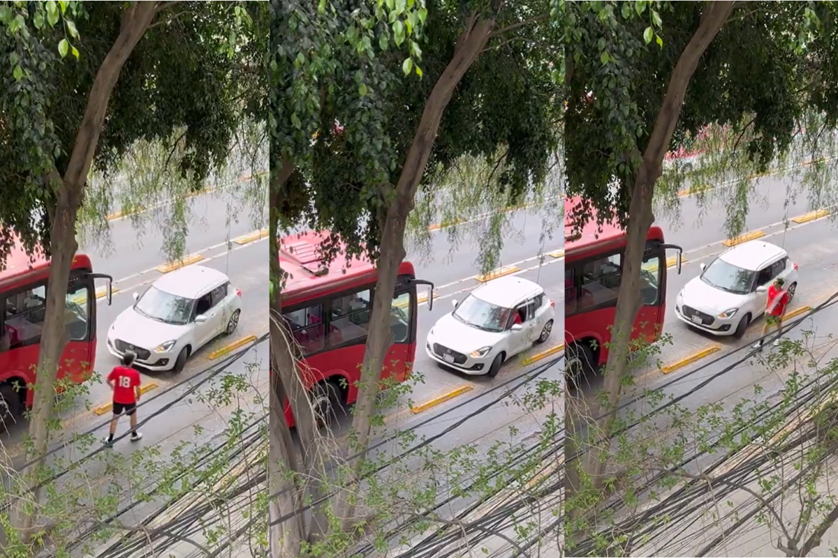 Automovilista invade carril de Metrobús y todavía se enoja.     Foto: Especial