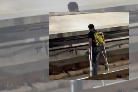 Video viral: hombre con muletas cruza las vías del Metro