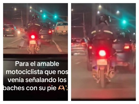 Motociclista advierte sobre baches a automovilistas (VIDEO)