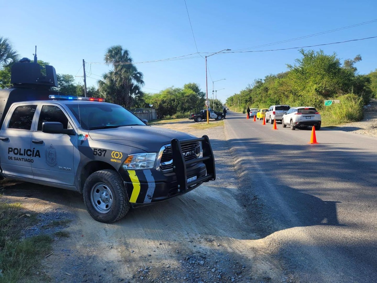 Patrulla de la policía municipal de Santiago en la avenida donde ocurrió el hecho. Foto: Secretaría de Seguridad Pública y Vialidad Santiago