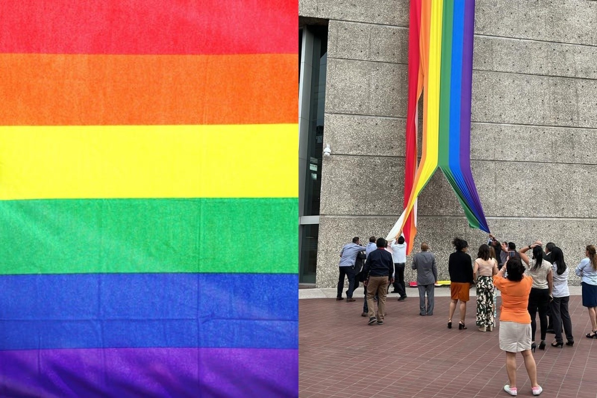 Bandera LGBTI  siendo arrancada de las instalaciones de INFONAVIT Foto: Especial